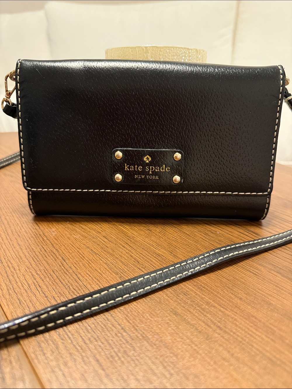kate spade black leather crossbody wallet with gold-tone logo plate